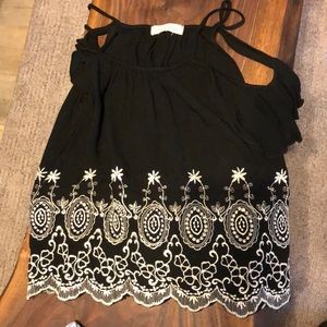 Black tank top with flowy sleeves
